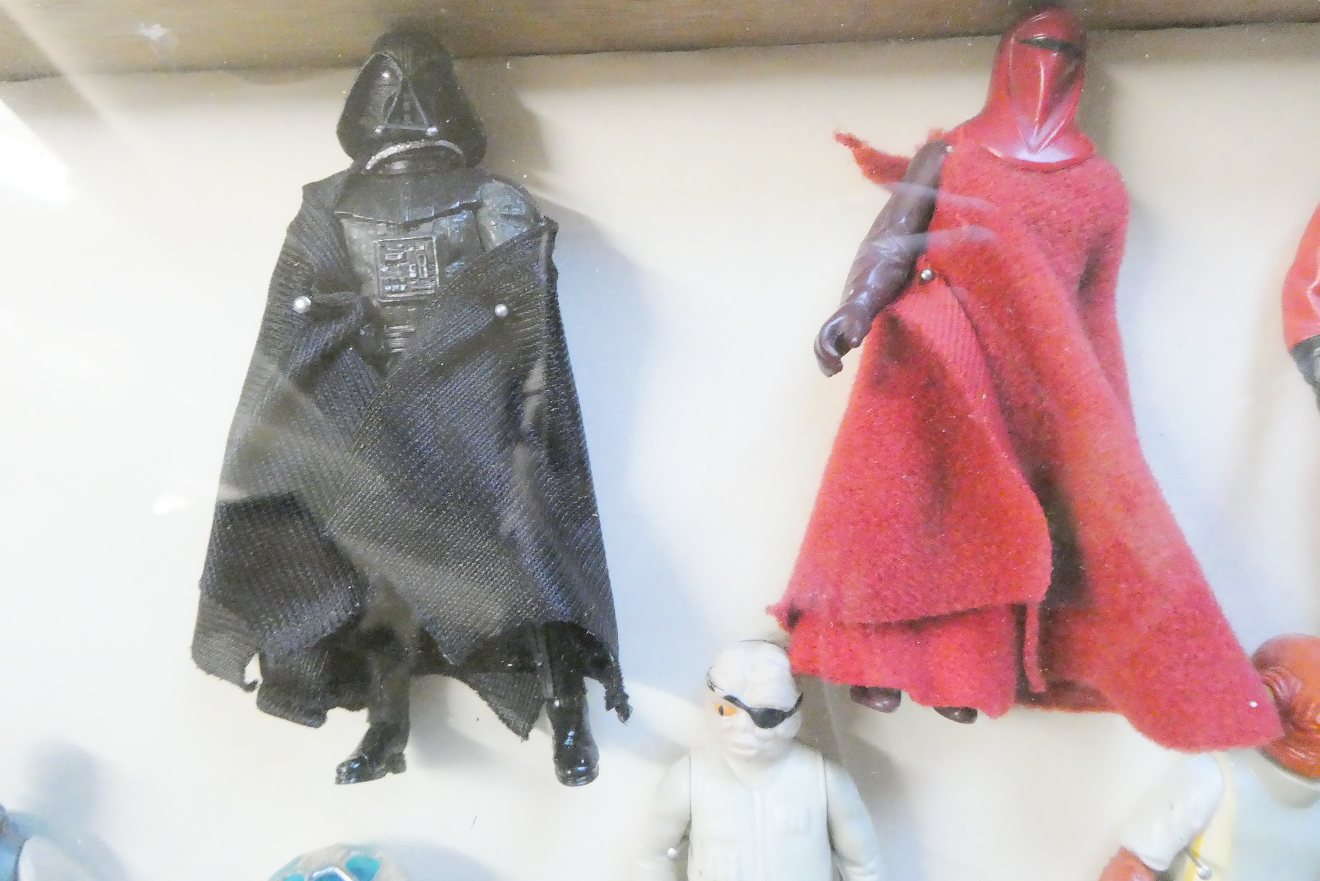 A display box containing eighteen Star Wars figures Image