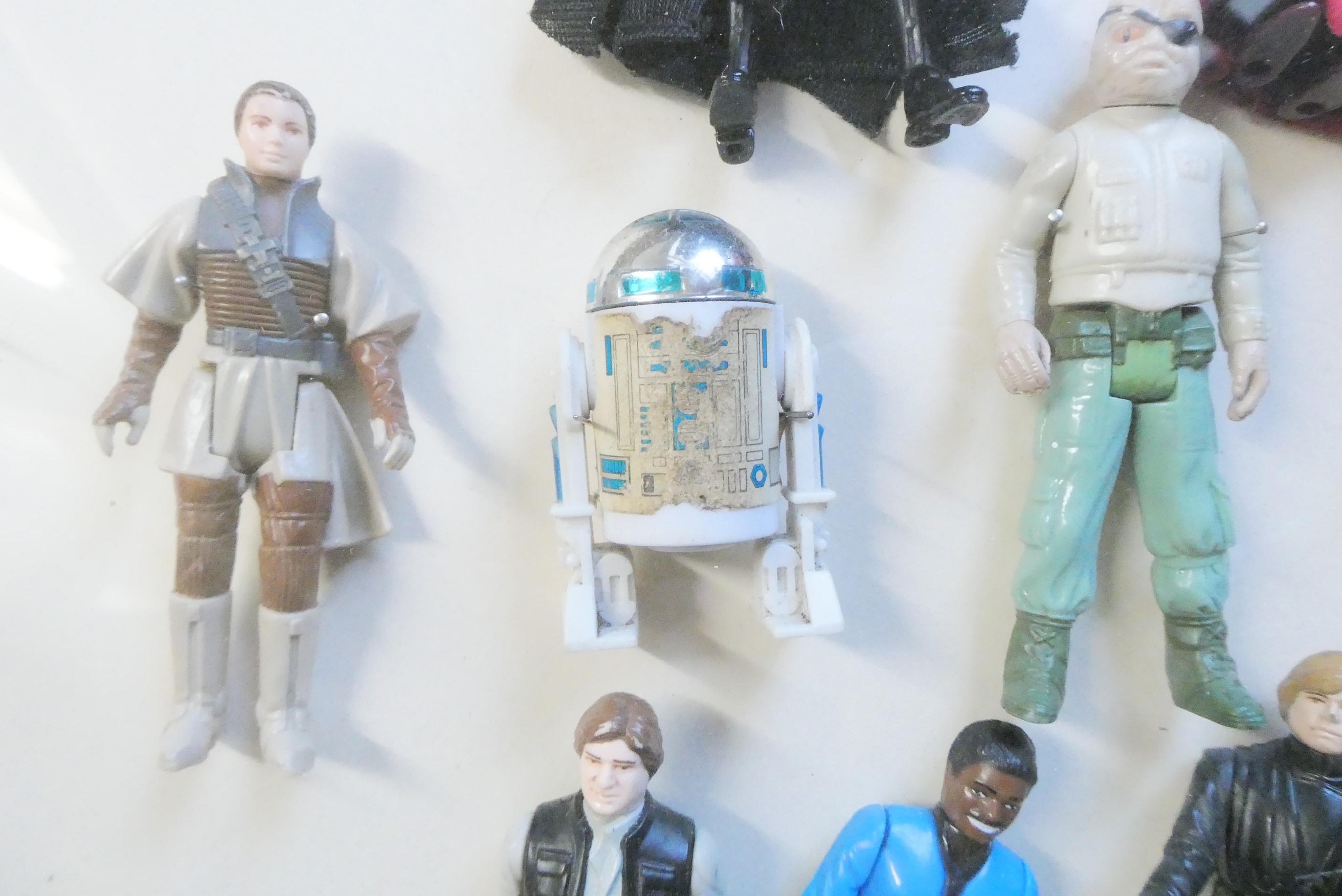 A display box containing eighteen Star Wars figures Image