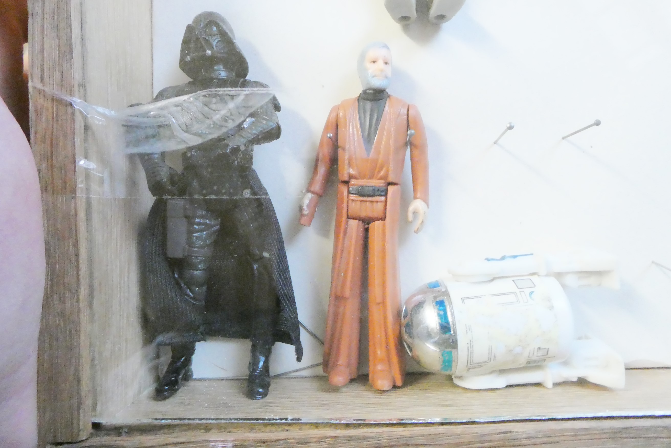 A display box containing eighteen Star Wars figures Image