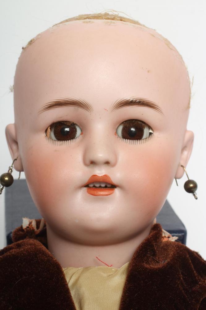 A Simon & Halbig bisque socket head doll Image