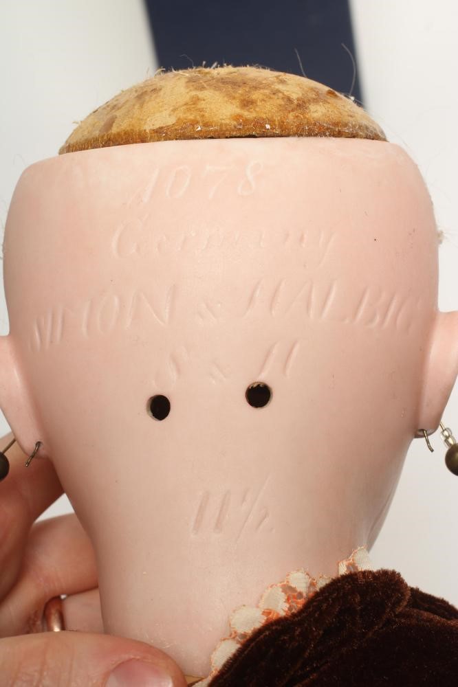 A Simon & Halbig bisque socket head doll Image