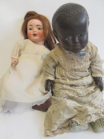 Two bisque socket head dolls Image