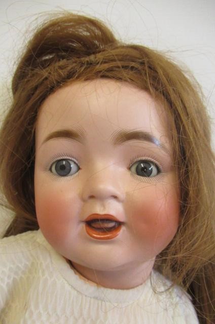 Two bisque socket head dolls Image