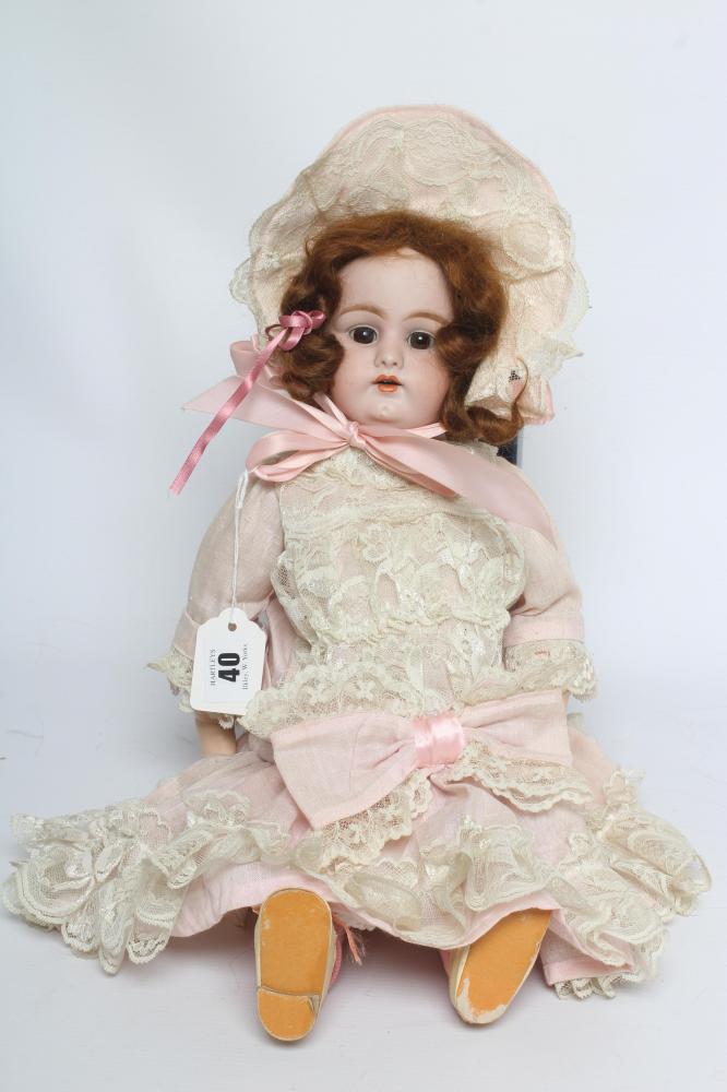 A Simon & Halbig bisque socket head doll Image
