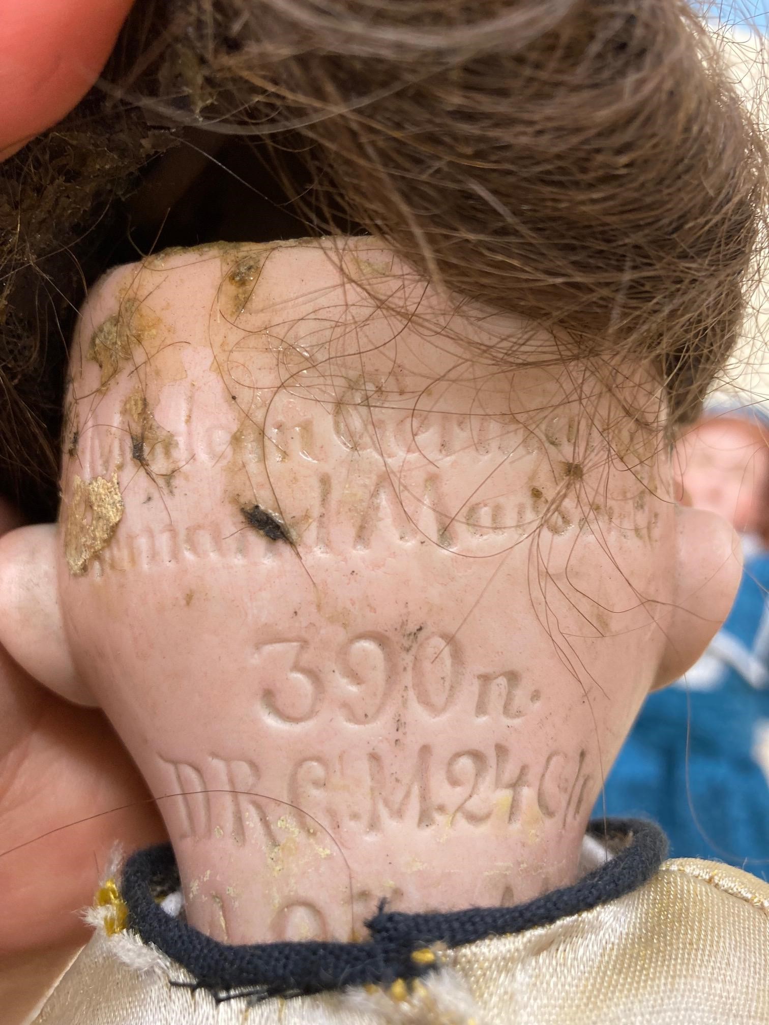 Two bisque socket head dolls, comprising a 14" doll with blue glass fixed eyes, Image