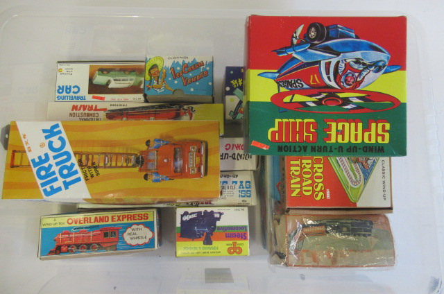A large quantity of modern issue clockwork and friction vehicles by Korean and Chinese manufacturers Image
