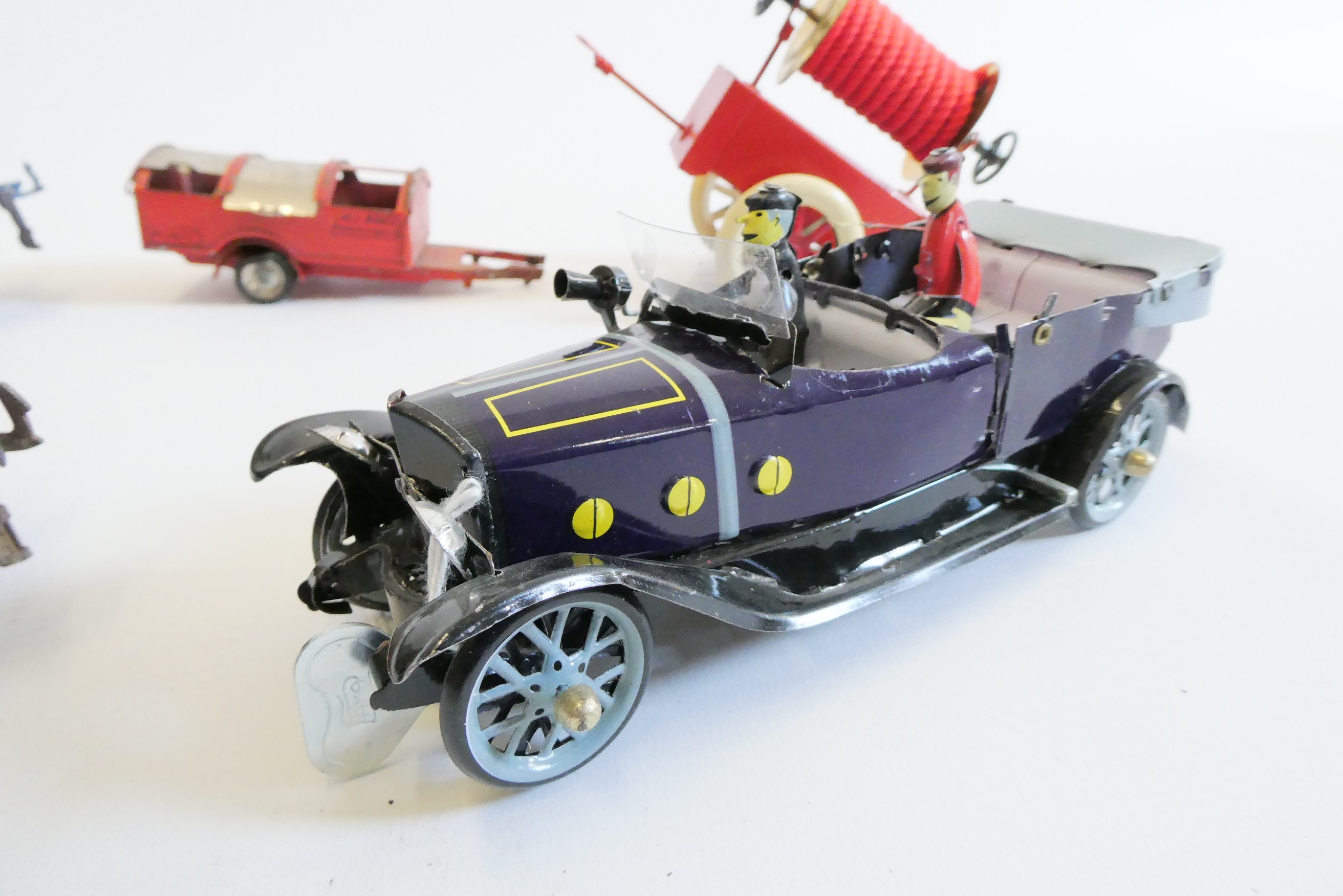 Playworn unboxed tinplate toys including town car Image