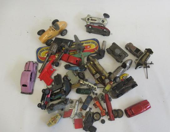 Playworn tinplate toys including race cars Image