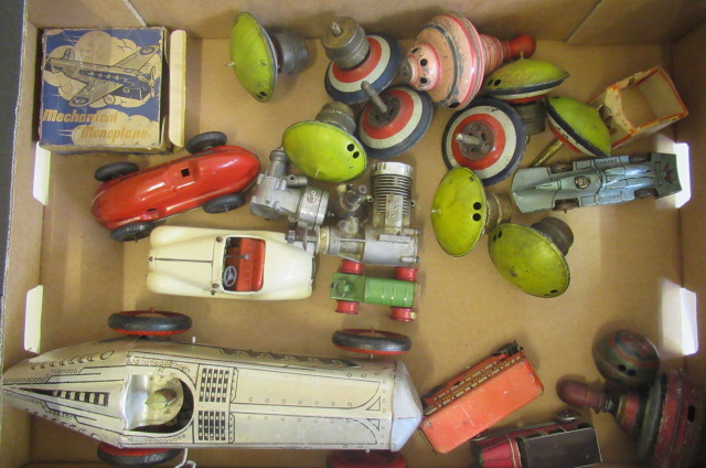 Playworn tinplate vehicles and spinning tops including silver race car Image