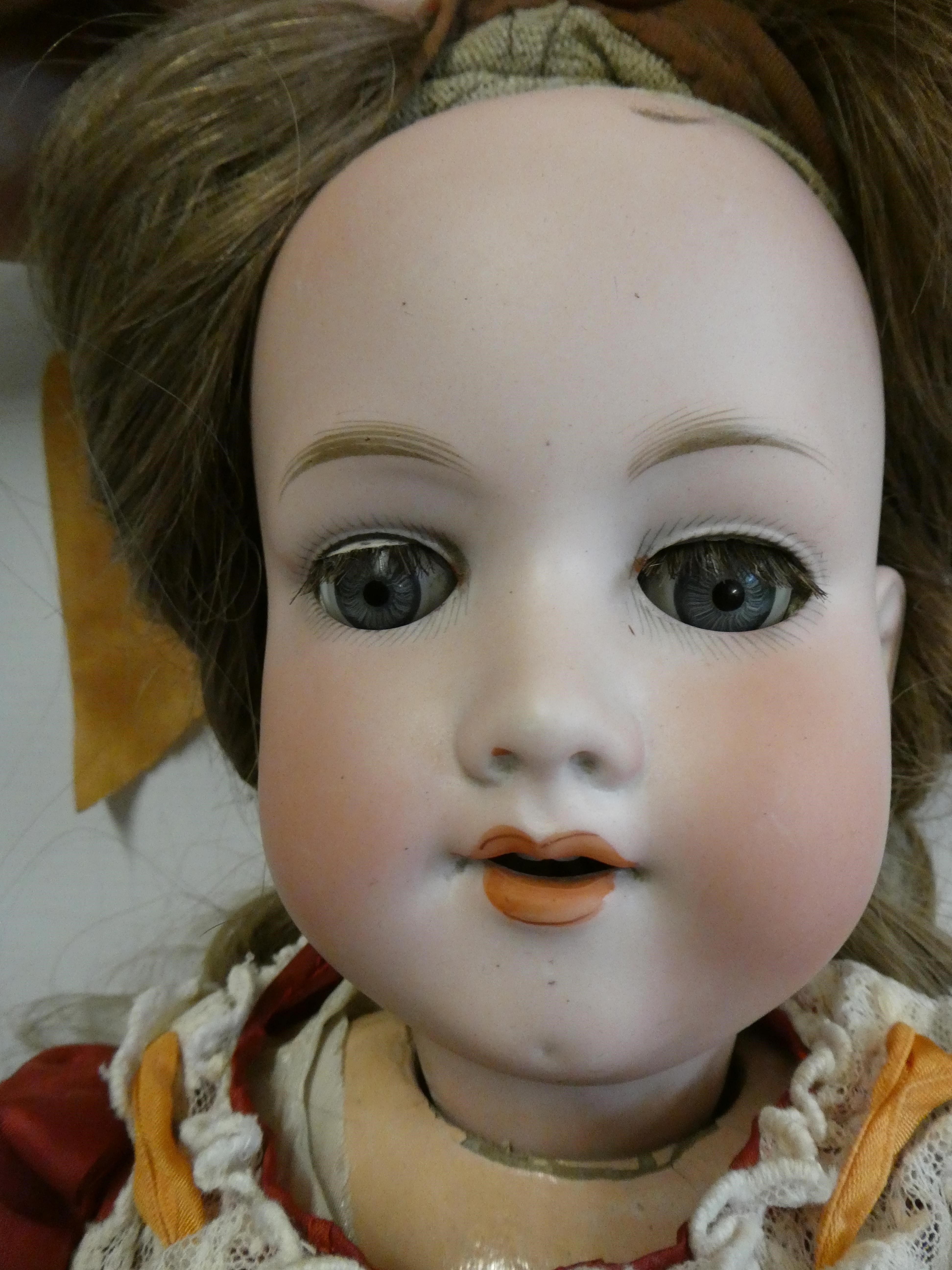 An Armand Marseille bisque socket head "mamma" doll Image