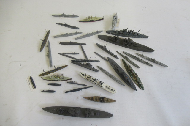 Solid cast water line and battle ship models from various makers Image