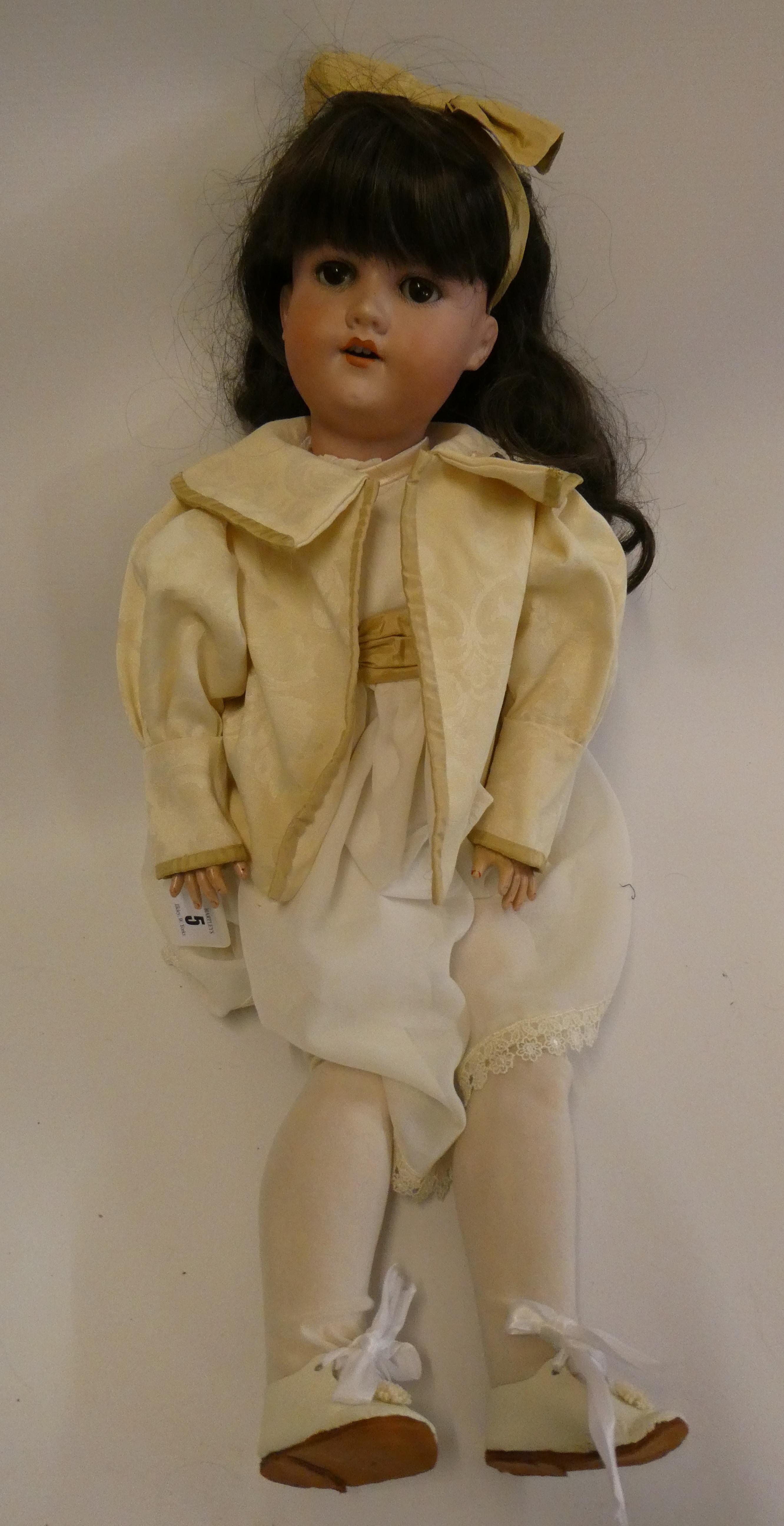 An Armand Marseille bisque socket head doll Image
