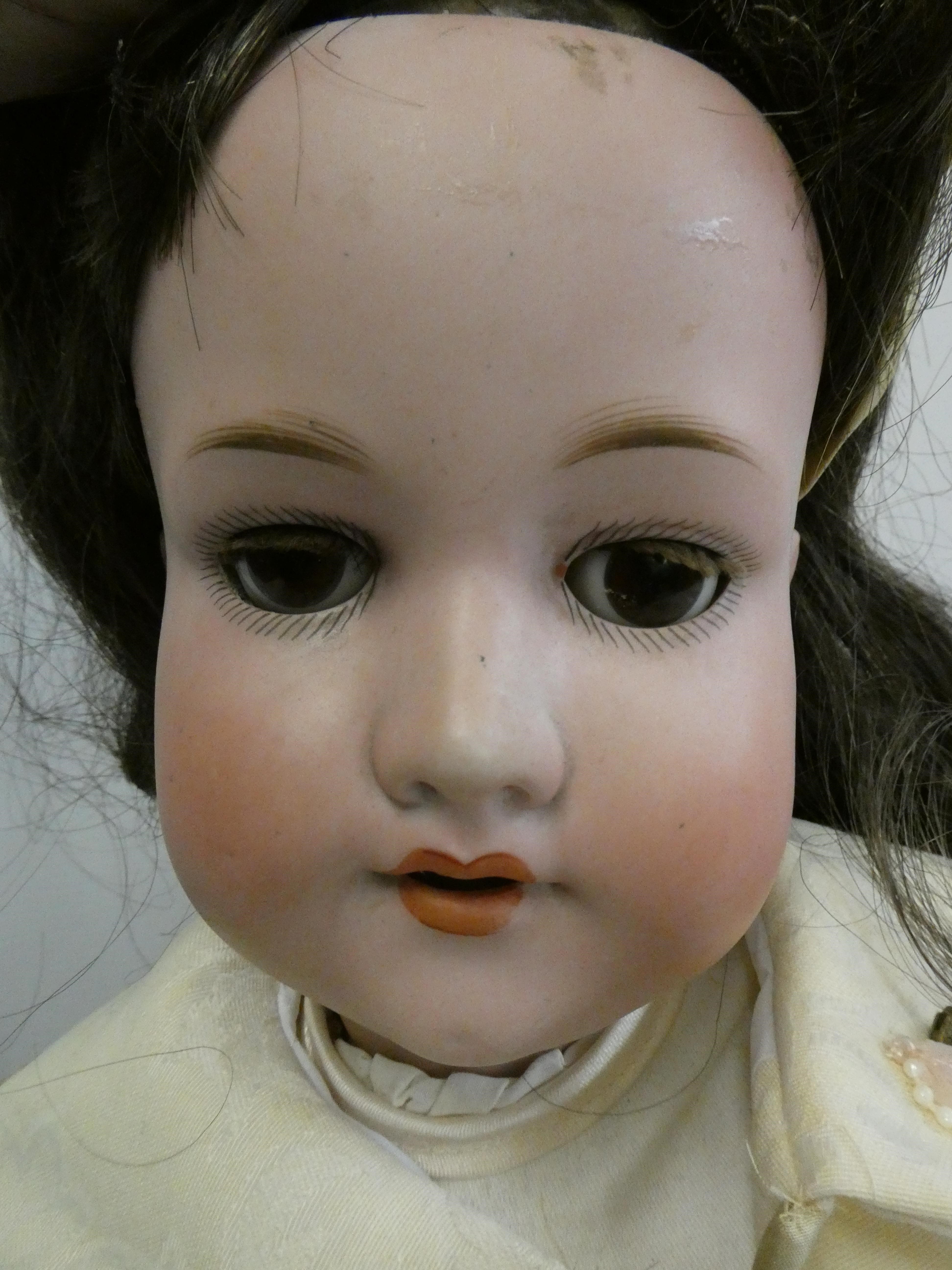 An Armand Marseille bisque socket head doll Image