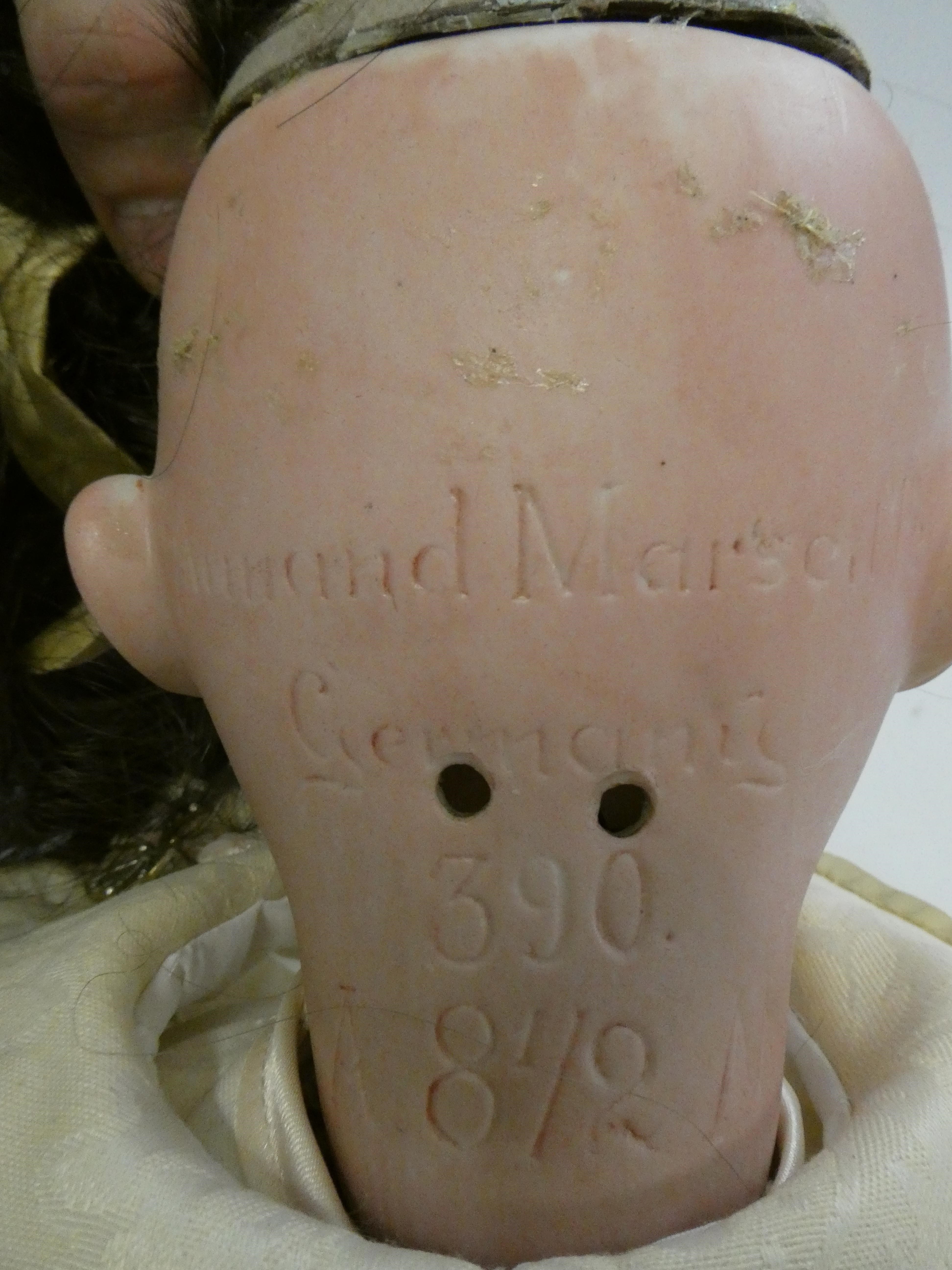 An Armand Marseille bisque socket head doll Image