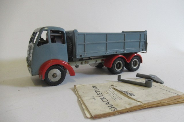 Shackleton clockwork Foden tipper lorry finished in pale blue/red Image