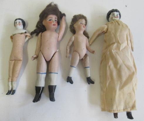 Four antique dolls Image
