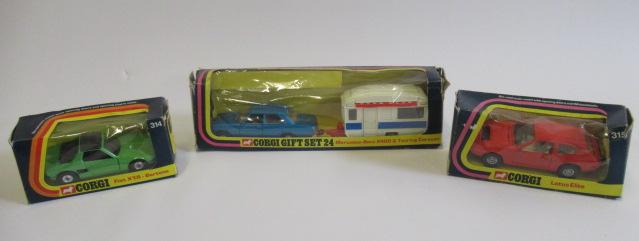 Three boxed Corgi cars Image