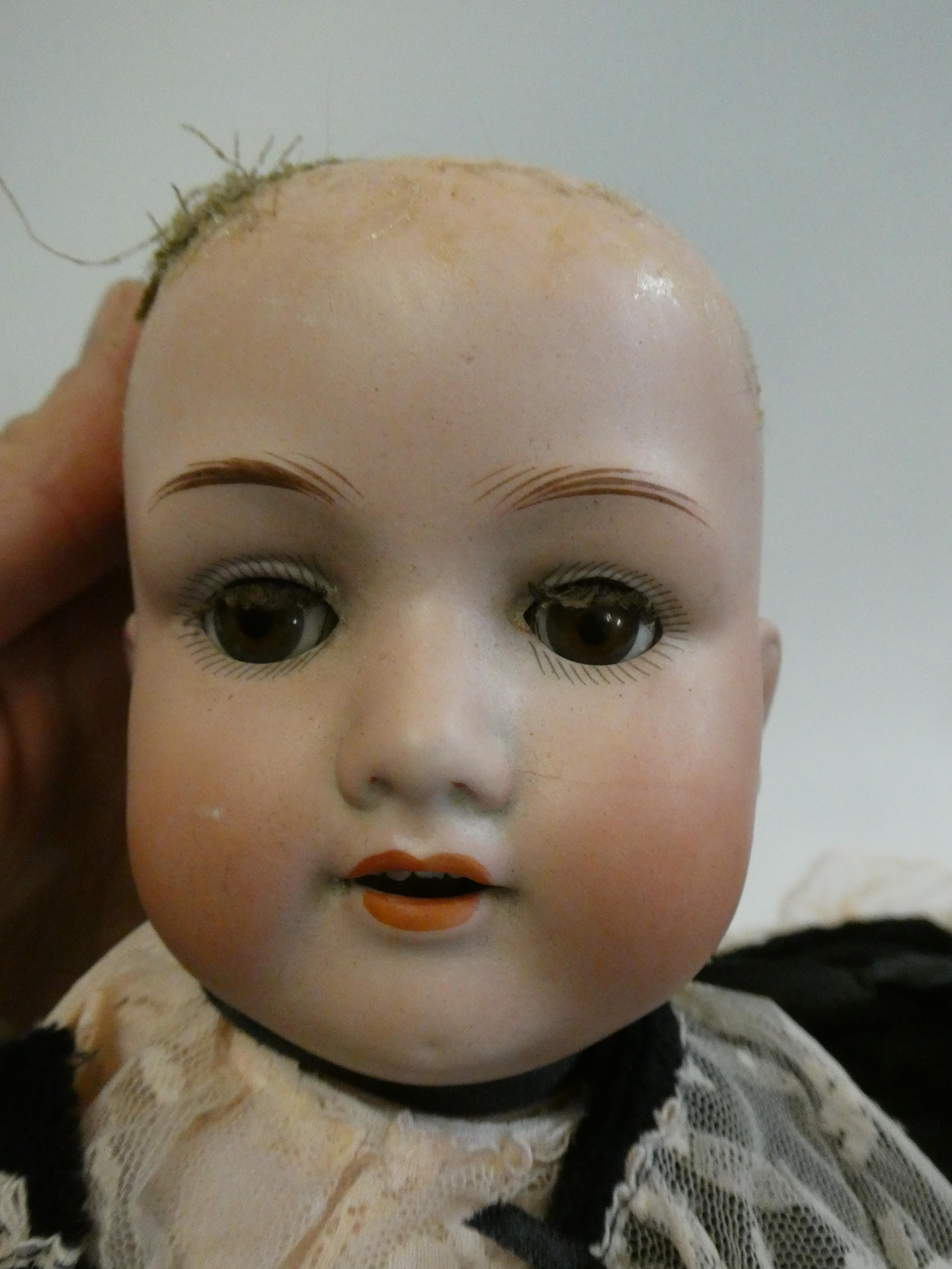 Two Armand Marseille bisque socket head dolls Image