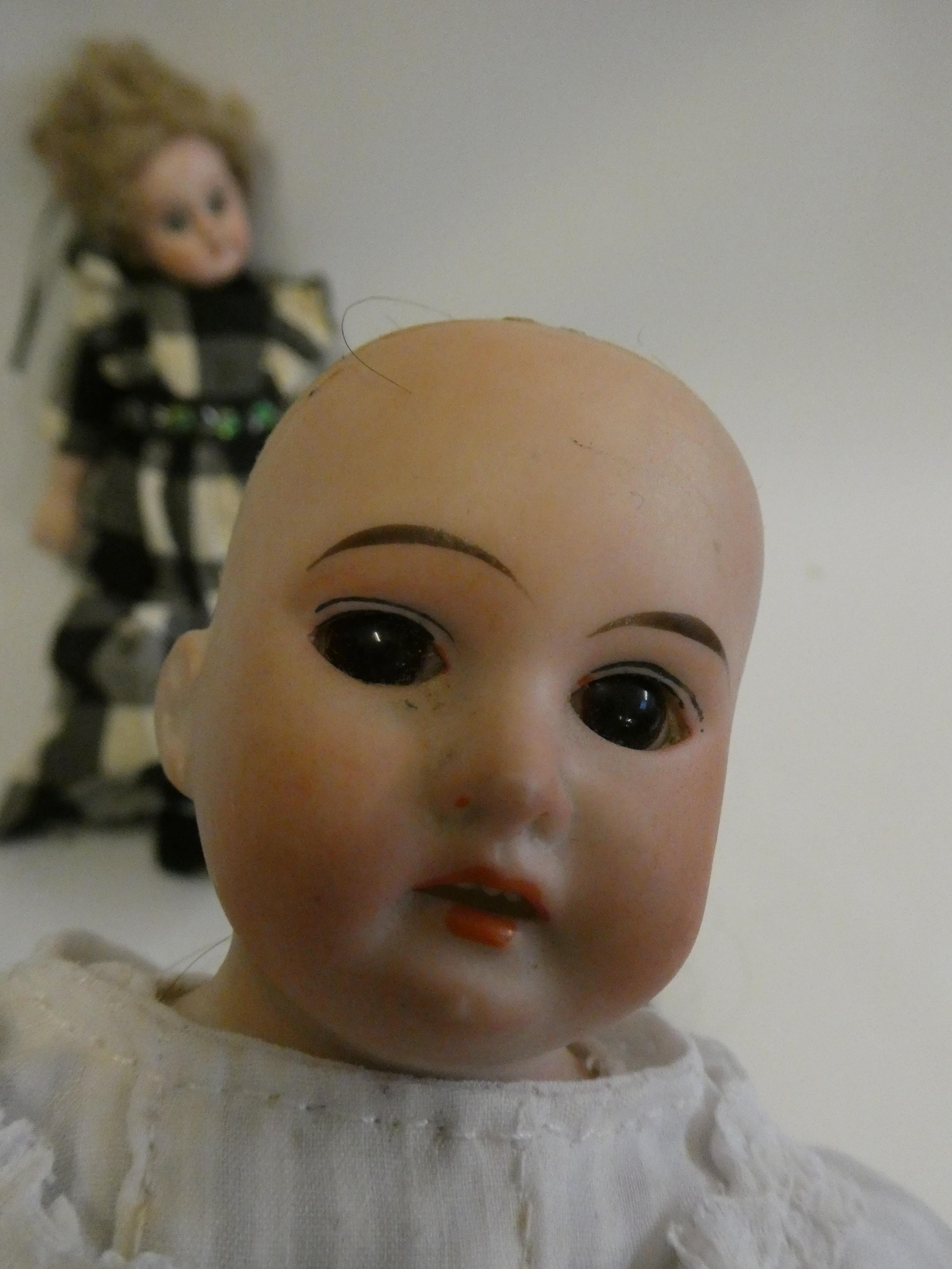 Two Armand Marseille bisque shoulder head dolls Image