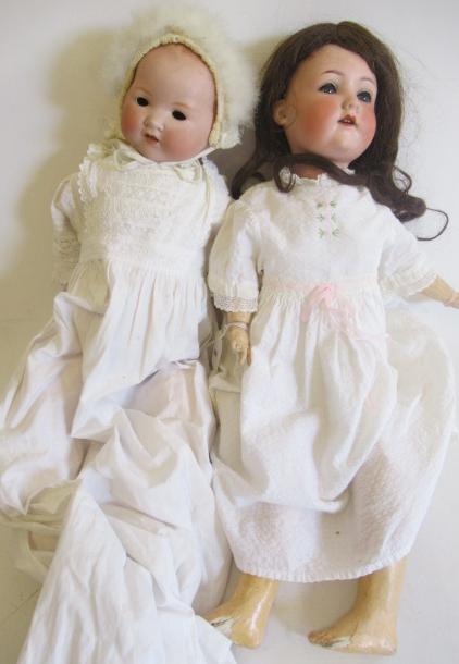 Two bisque socket head dolls Image