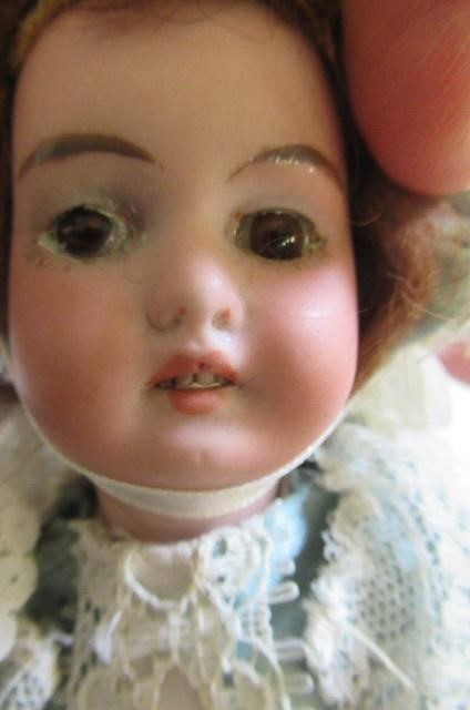 Two small bisque head dolls Image