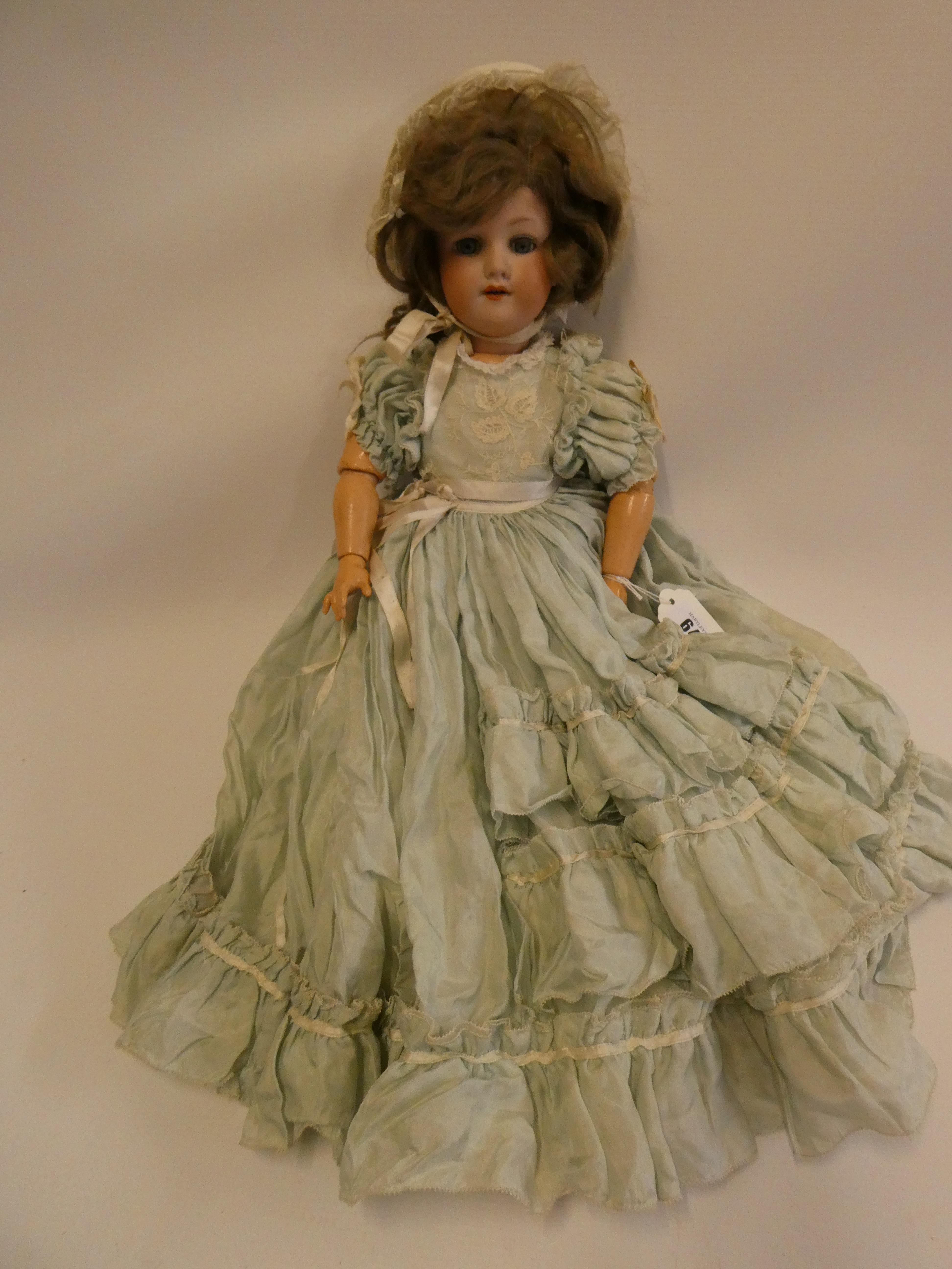 An Armand Marseille bisque socket head doll Image