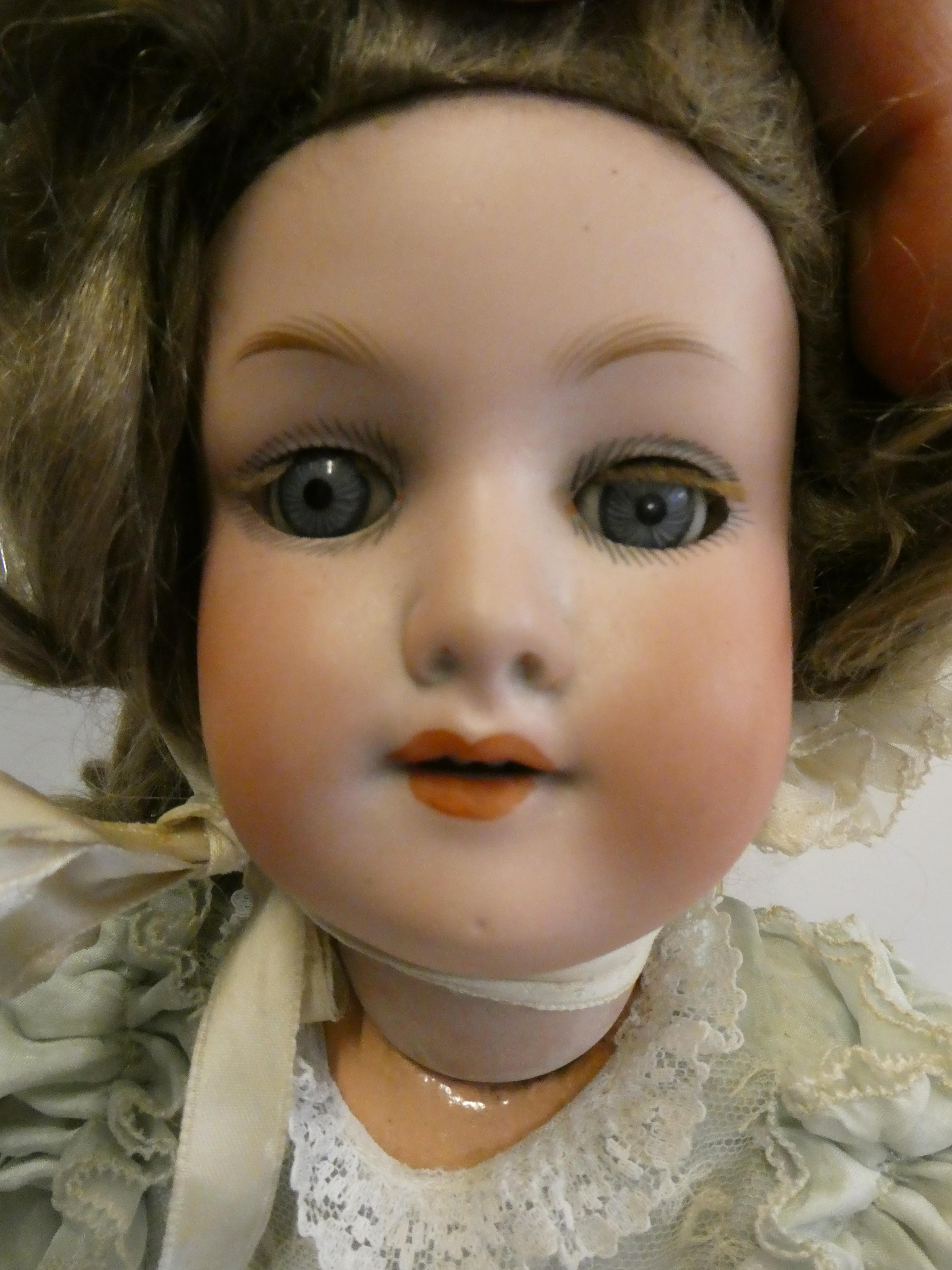An Armand Marseille bisque socket head doll Image
