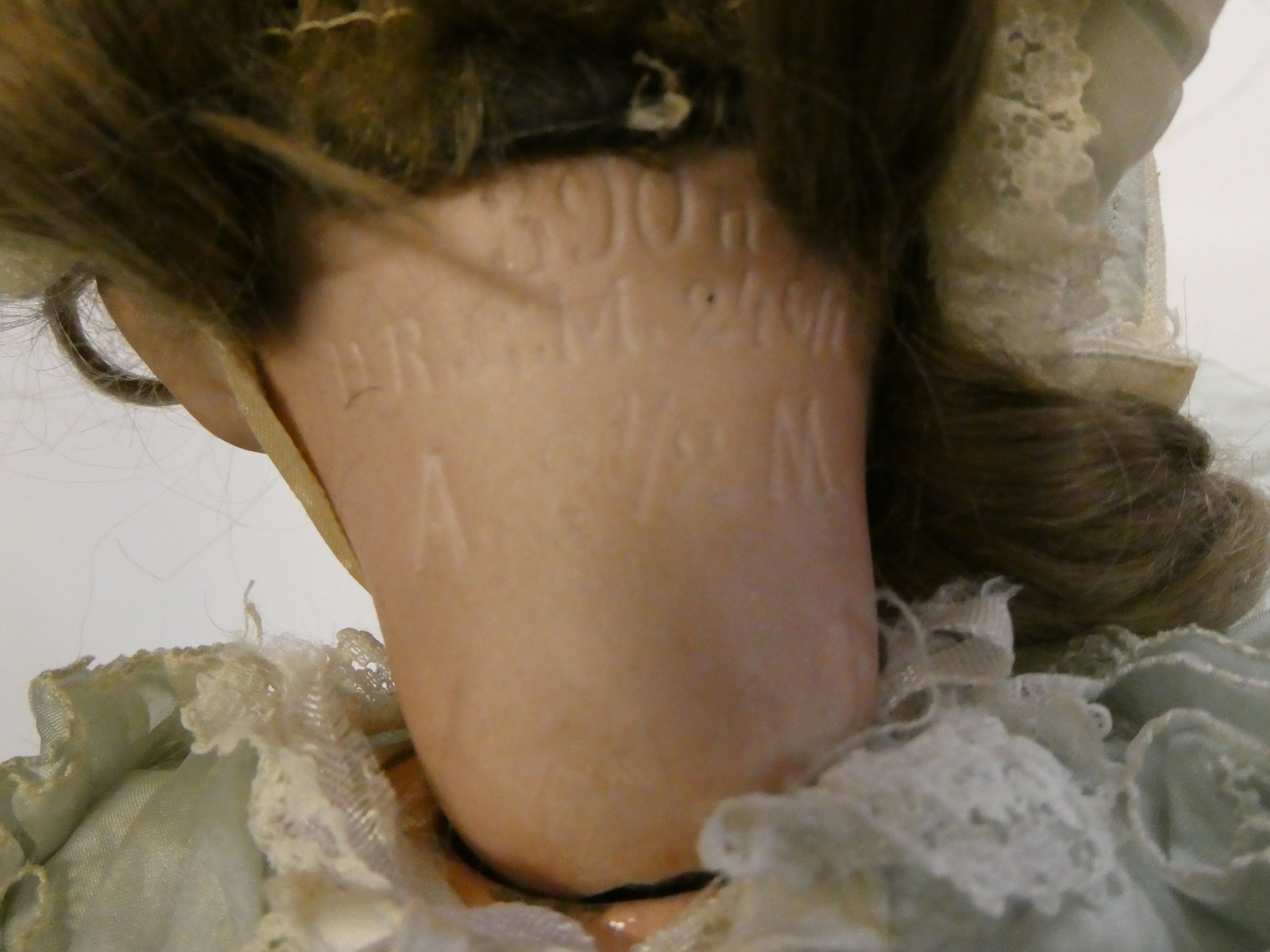 An Armand Marseille bisque socket head doll Image