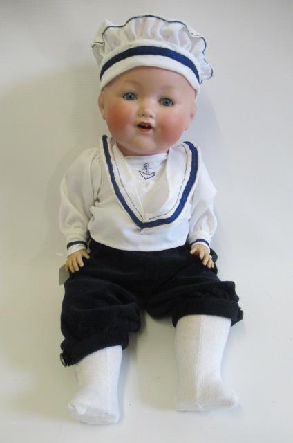 An Armand Marseille bisque socket head character boy doll Image