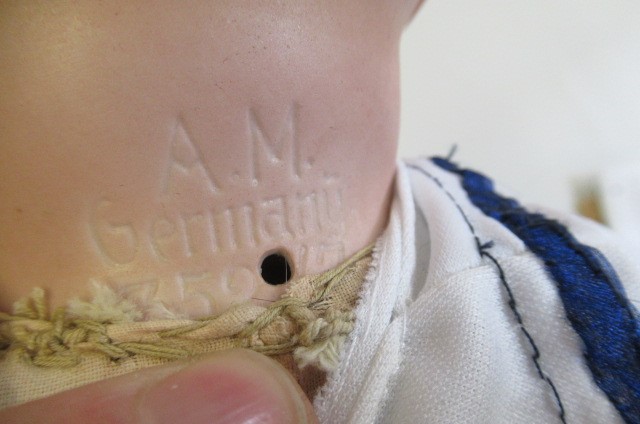 An Armand Marseille bisque socket head character boy doll Image