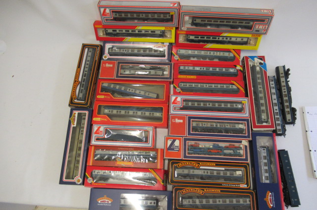 Twenty four B.R. blue passenger coaches by Hornby Image