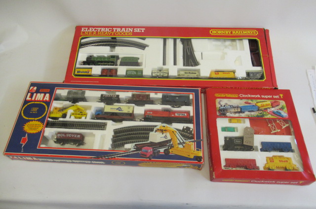 Three train sets comprising Hornby Clockwork Super Set Image