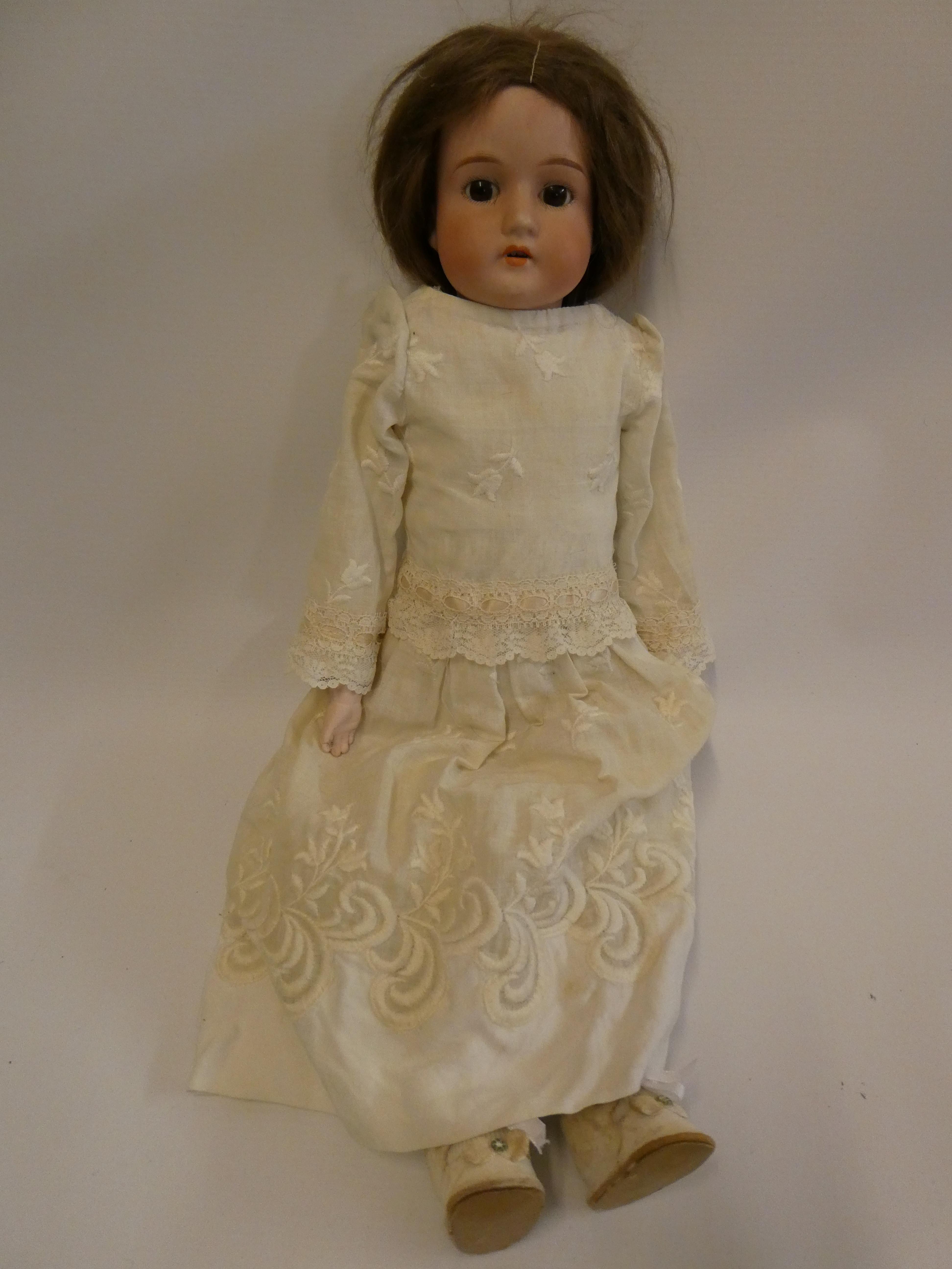 An Armand Marseille bisque shoulder head doll Image