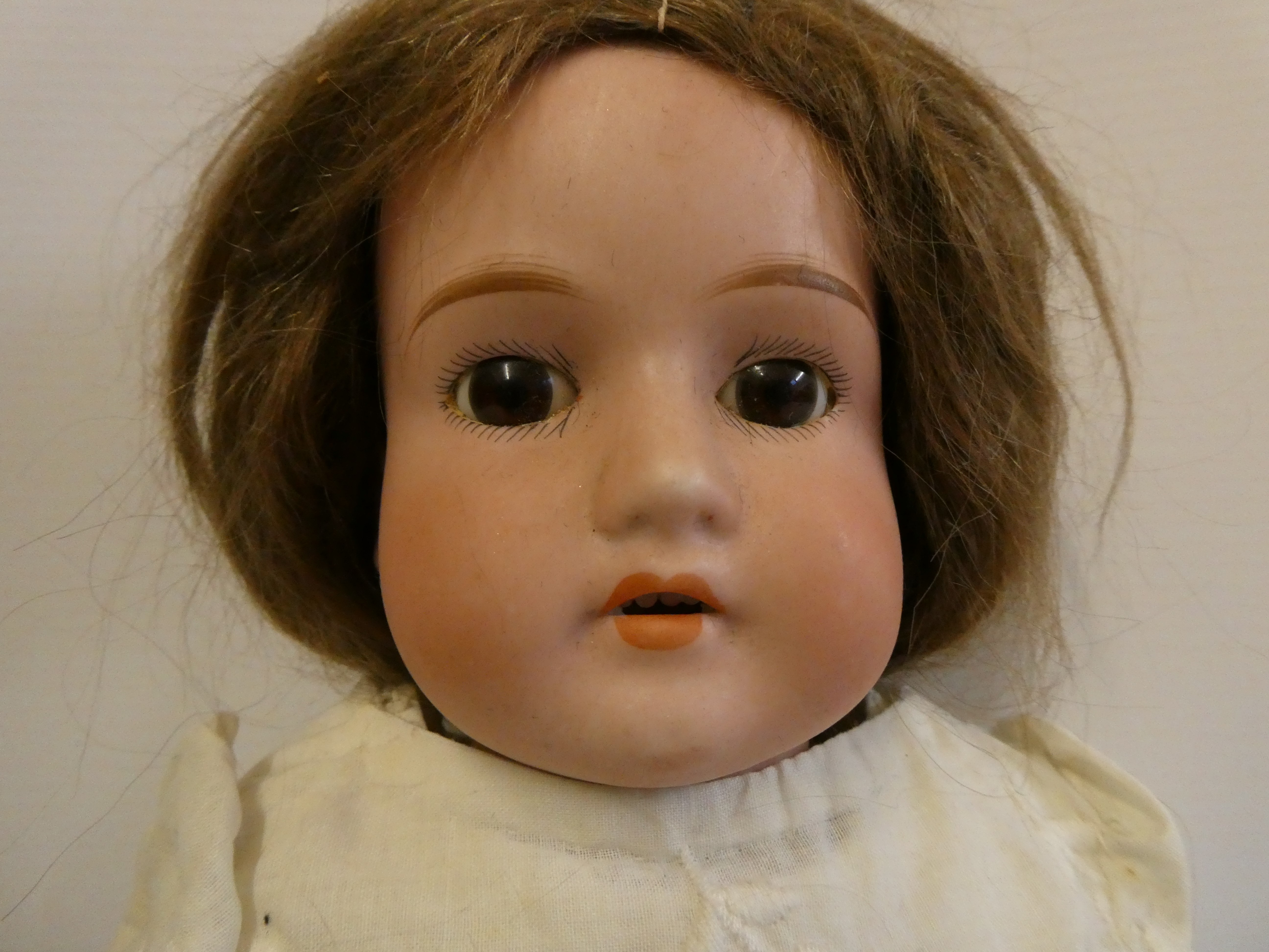 An Armand Marseille bisque shoulder head doll Image
