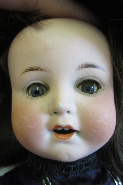 An Armand Marseille bisque socket head doll Image