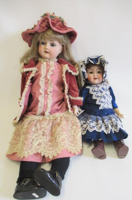 Two bisque socket head dolls Image