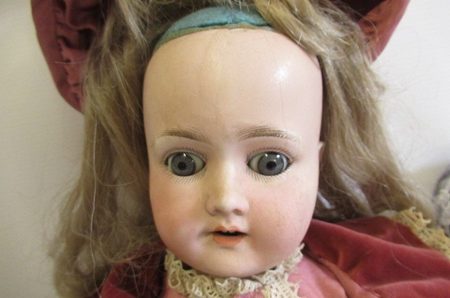 Two bisque socket head dolls Image