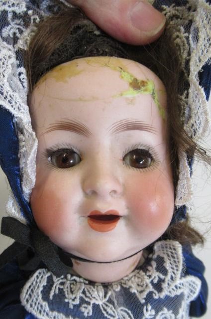 Two bisque socket head dolls Image