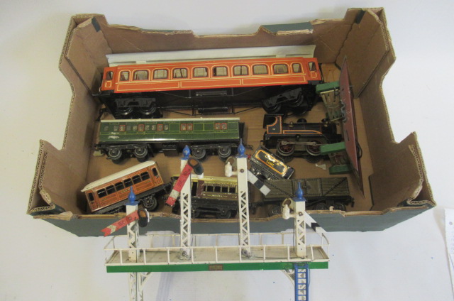 Locomotive and rolling stock by Hornby and others including S.R. passenger coach Image