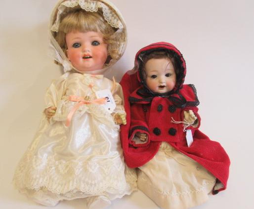 Two bisque socket head dolls Image