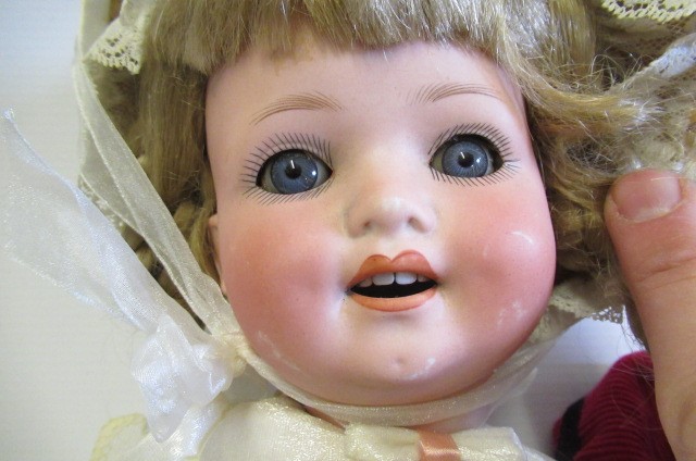 Two bisque socket head dolls Image