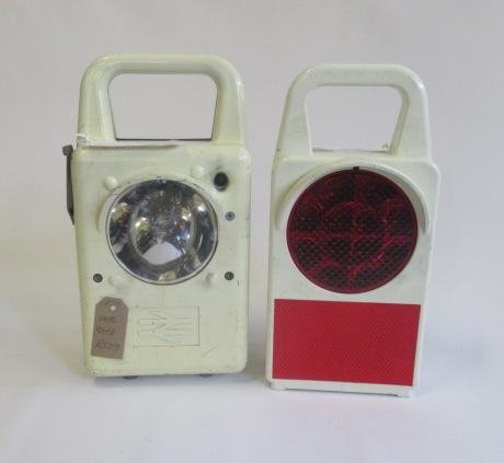 Two British Rail plastic battery train lights comprising tail light and clear light Image