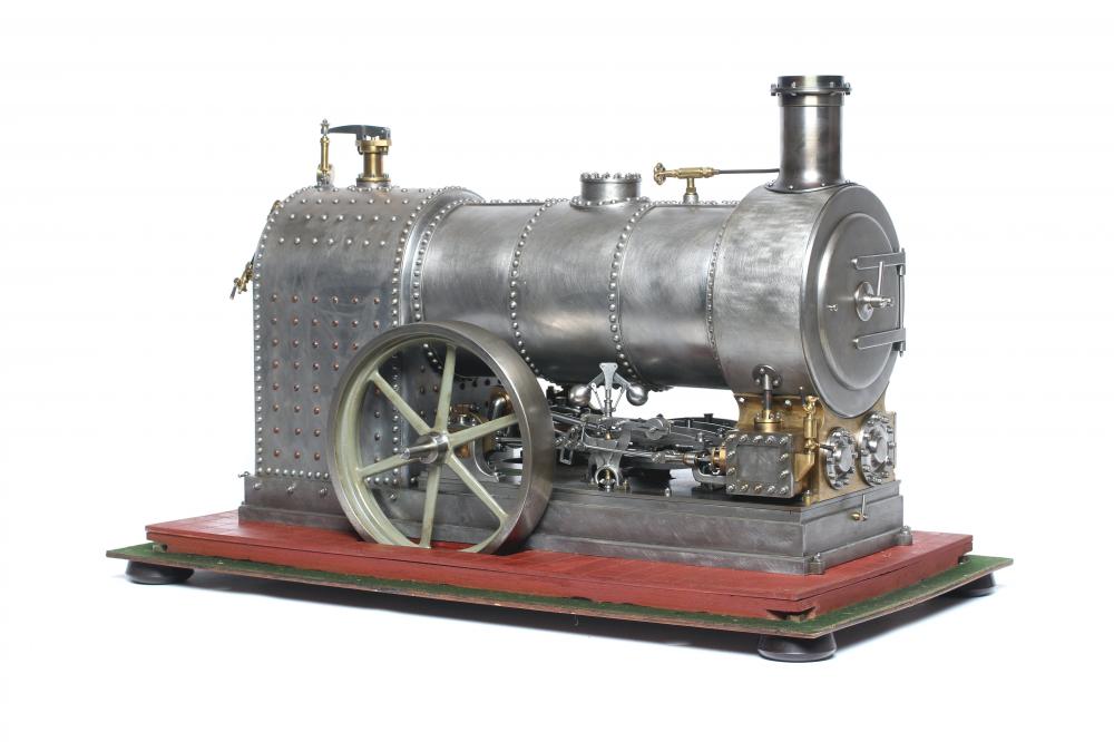 A large locomotive boilered under type compound steam engine made by Frank Baines circa 1945. All Image
