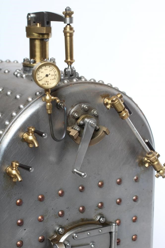 A large locomotive boilered under type compound steam engine made by Frank Baines circa 1945. All Image