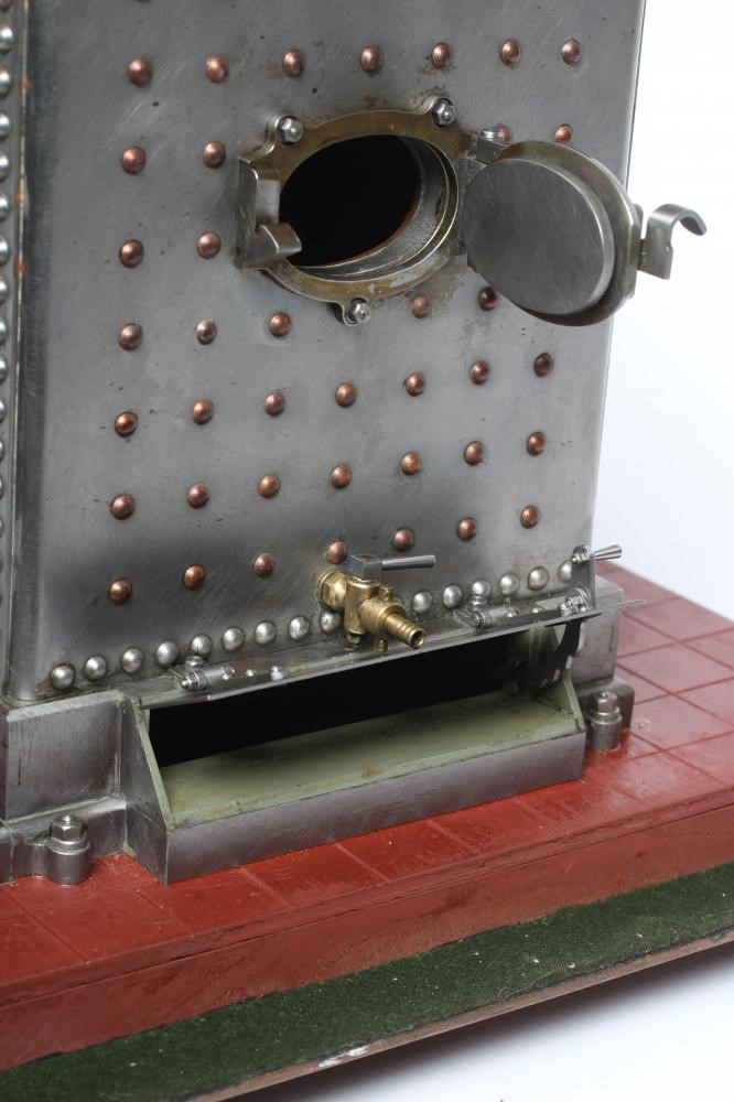 A large locomotive boilered under type compound steam engine made by Frank Baines circa 1945. All Image