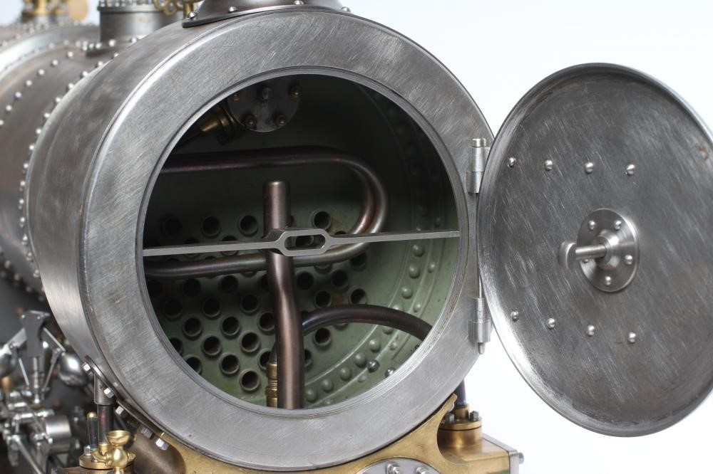 A large locomotive boilered under type compound steam engine made by Frank Baines circa 1945. All Image