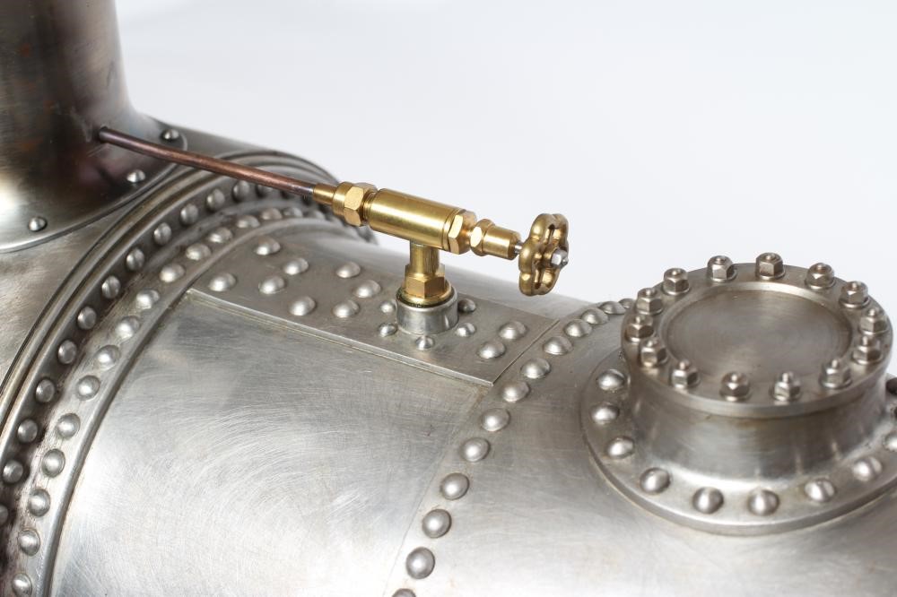 A large locomotive boilered under type compound steam engine made by Frank Baines circa 1945. All Image