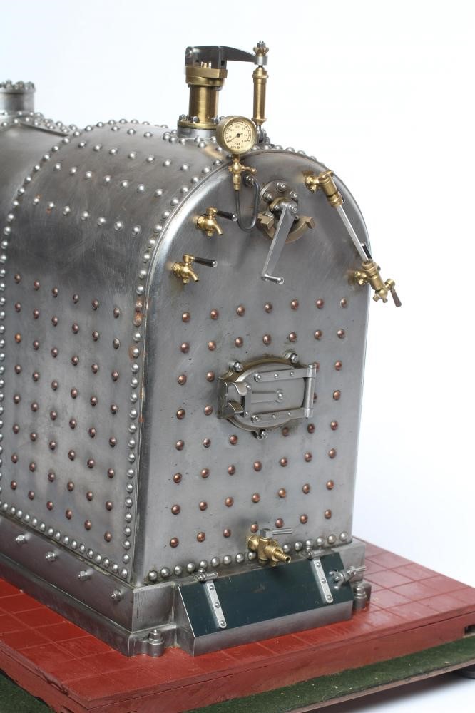 A large locomotive boilered under type compound steam engine made by Frank Baines circa 1945. All Image