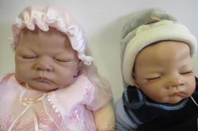 Four Ashton Drake dolls Image