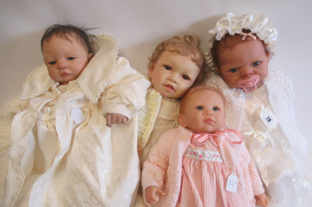 Four Ashton Drake dolls Image